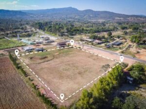 Aerial view of a new home lot with marked property boundaries before boundary surveying and design planning.